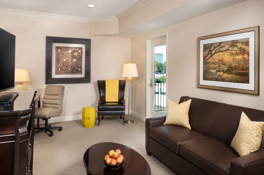 Ayres Hotel Orange Executive King Suite Living Room Guestroom