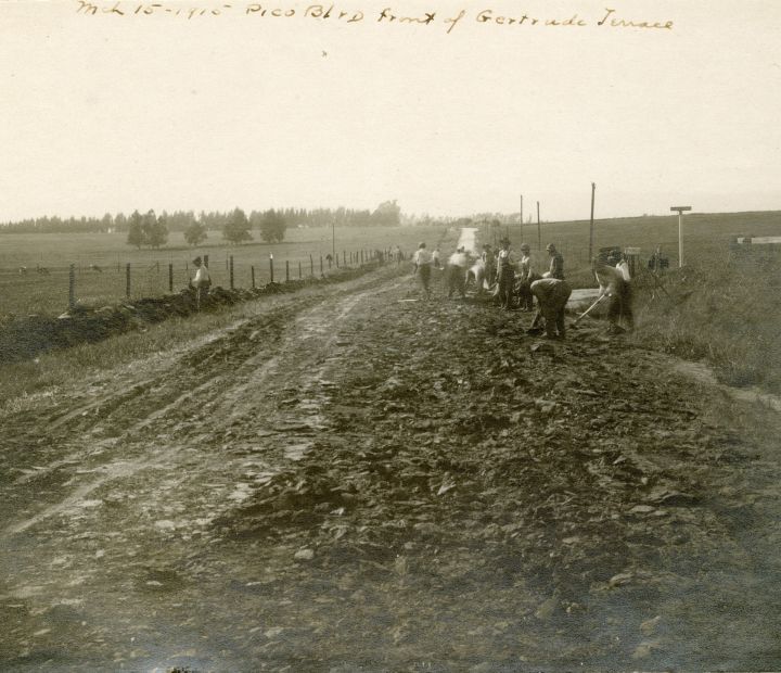 Dirt Road with workers on it