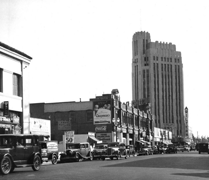Wilshire Blvd Wiltern Theater in the background with cars going by