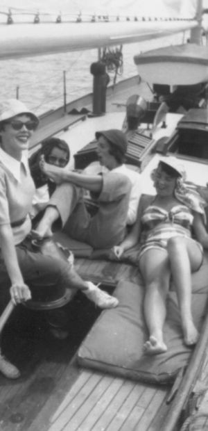 Ayres Family Sitting and sunbathing in the Skylark (boat)