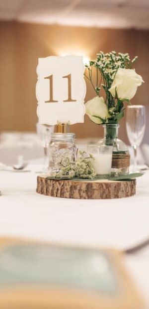 Wedding Reception Table Decor with Wine Glasses and Wooden Accents
