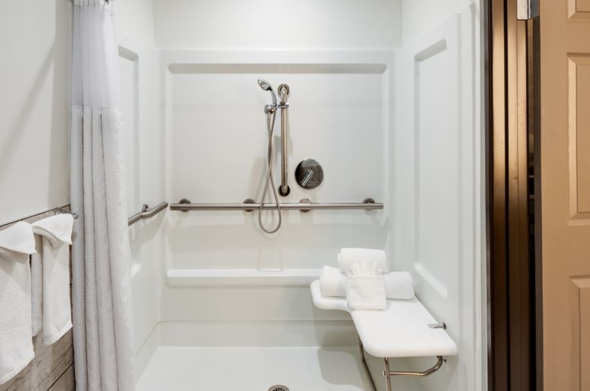 A Bathroom With A Tub Sink And Toilet